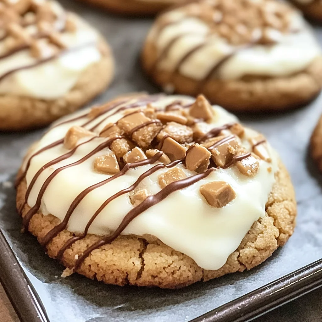 Cheesecake-Stuffed Cookies with White Chocolate and Reese’s